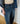 WOMEN CURVED DENIM PANTS